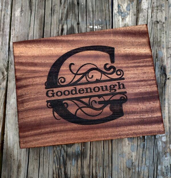 Custom butting board with the words "Goodenough" engraved in the wood