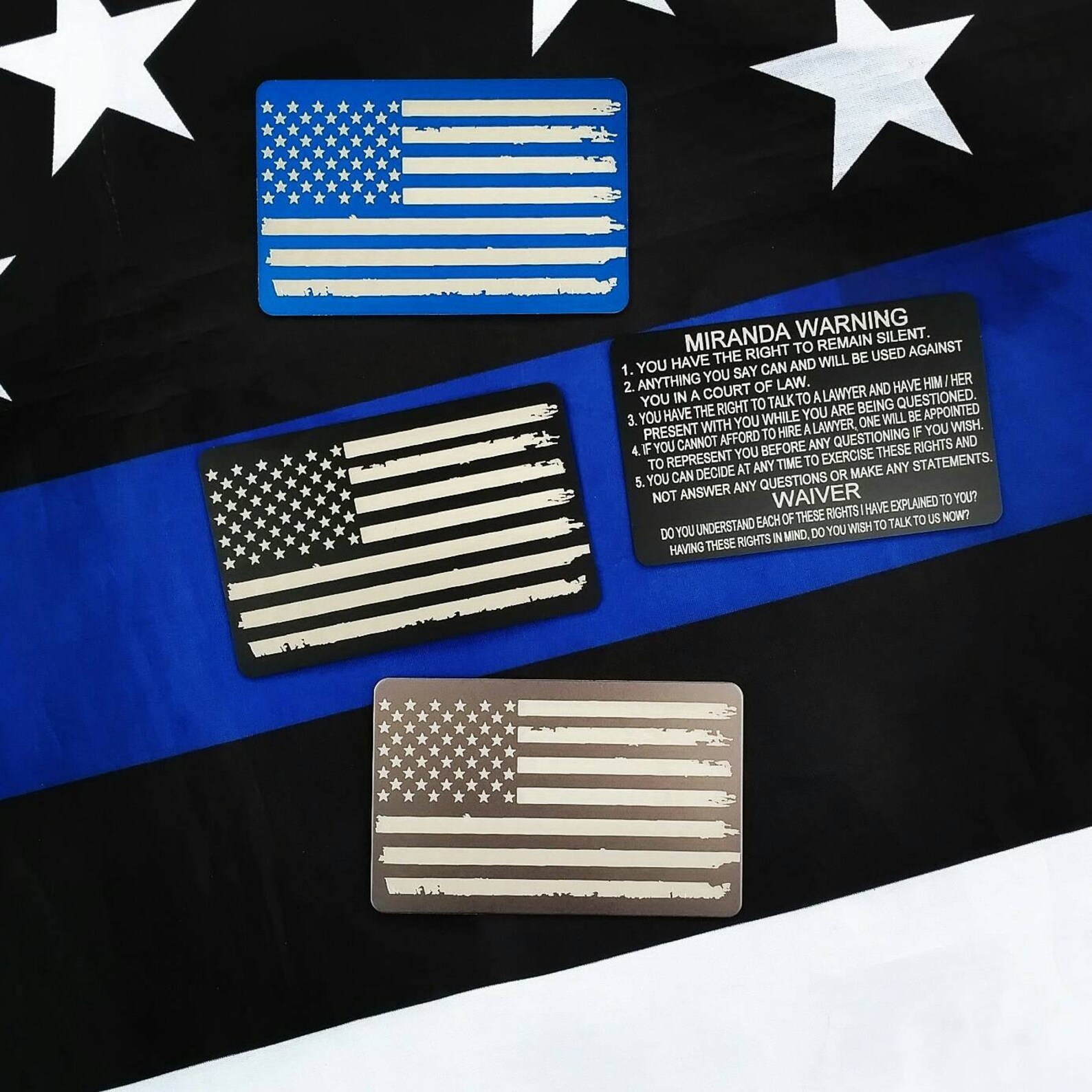 Metal Miranda Cards with Torn American Flag on the Back