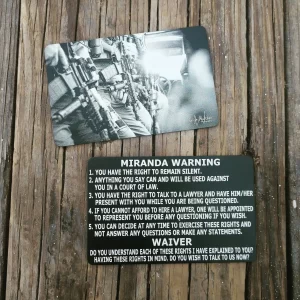 SWAT Theme Metal Miranda Card on a wooden background